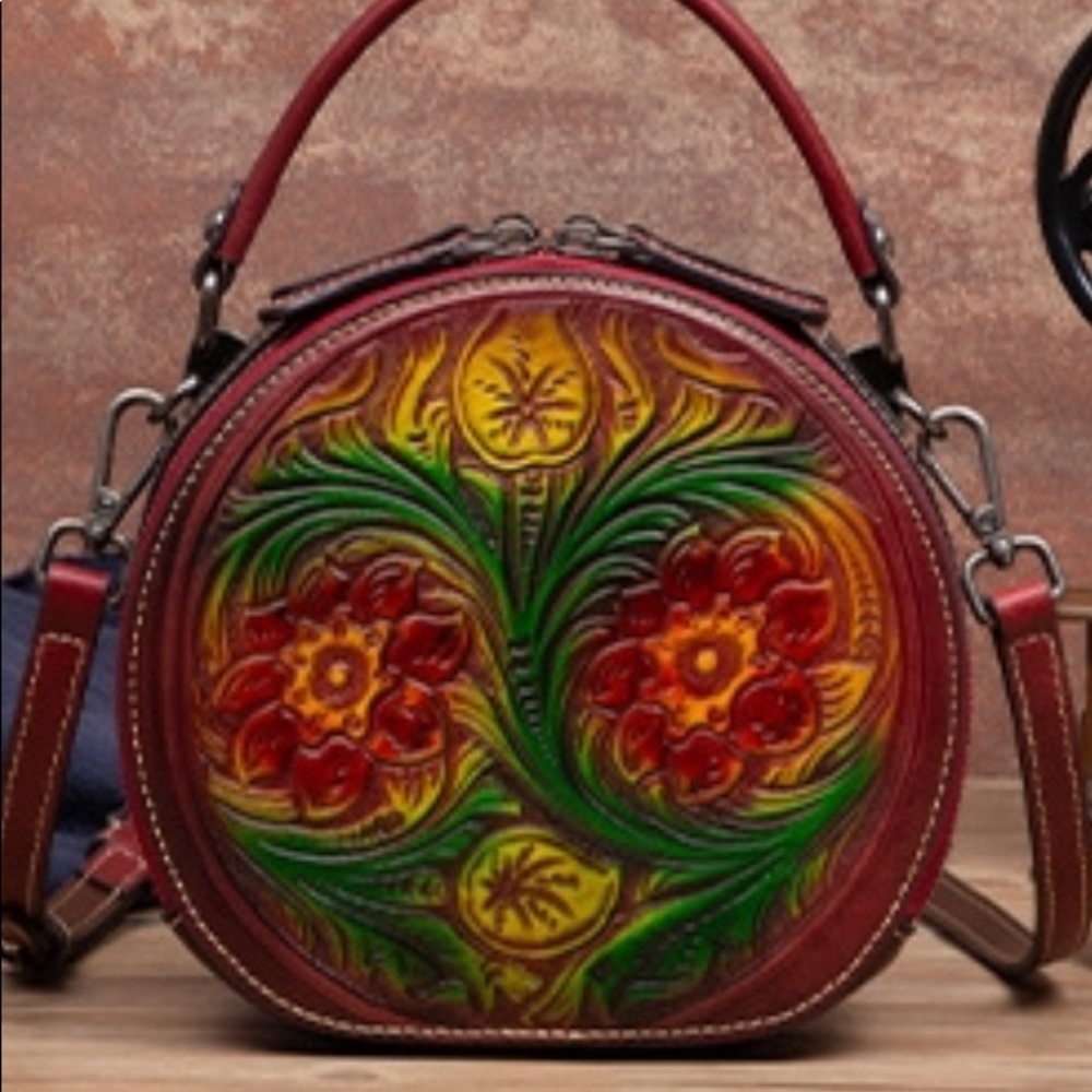 100% genuine leather with embossed floral feature
